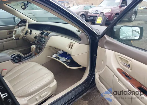 2004 Toyota Avalon Xls z USA, uszkodzony, nr VIN 4T1BF28B64U353071